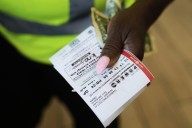 Sunblock, charcoal … and Powerball? Holiday weekend lottery drawing worth $1 billion