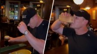 The champ is here! Watch John Cena visit Dublin pub and down a pint of Guinness
