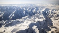 Hopes fade for injured climber stuck up an icy mountain for 12 days after breaking her leg