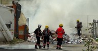 'Explosive' bin lorry fire caught on video disrupts Cambridge Airport