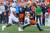 Beatty returns punt for TD, breaks Grange's 102-year-old record in No. 12 Illini's opening rout