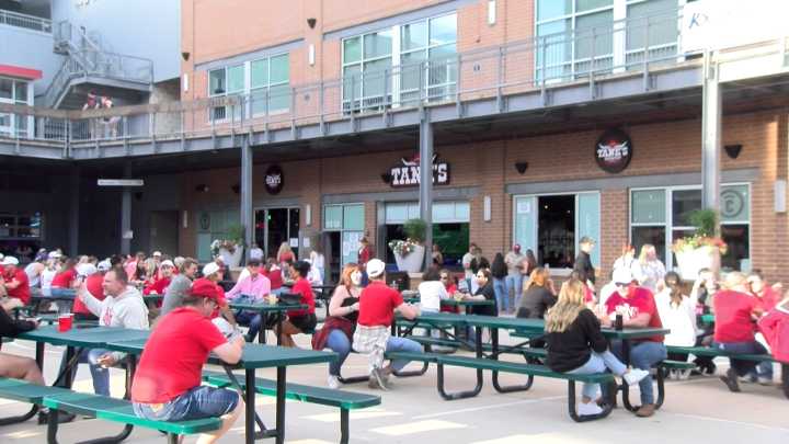 Husker fans create sea of red at Railyard watch party, giving bars a big boost