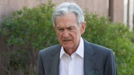 Powell indicates conditions 'may warrant' interest rate cuts as Fed proceeds 'carefully'
