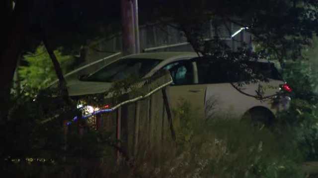 1 person seriously hurt after driver crashes off Omaha interstate, through fence