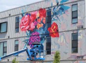 PHOTOS: Mural nears completion in Rogers