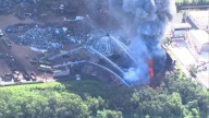 Large scrapyard fire burns in Hillsborough County, two firefighters hospitalized