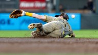 Costly error, lots of walks sink Padres in loss to Twins