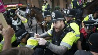 U.K. migrant protests spark angry confrontations as government scrambles to respond