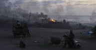Israel's defense minister says Gaza City could be destroyed as Israeli strikes kill 17 Palestinians