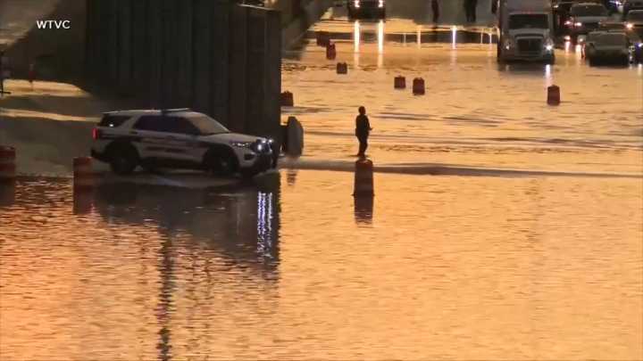 Parents and child killed when tree falls on car as heavy rain and flooding hit Tennessee