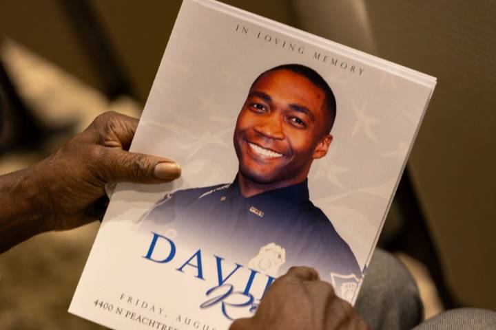 Law enforcement officers remember police officer who died after CDC shooting