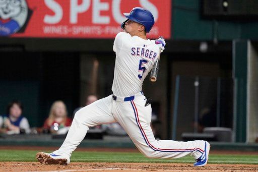 Rangers get trio of 3-run homers and Seager goes deep in 20