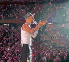 Moment rapper stops concert to 26,000 fans to berate ‘irresponsible’ mum who brought her one