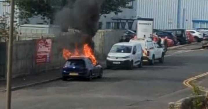 Moment East Lothian car bursts into flames at industrial estate as workers watch on