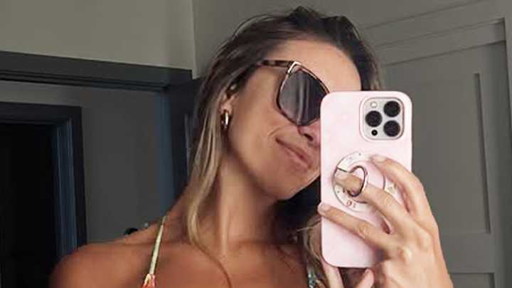 World's sexiest volleyball star Kayla Simmons almost pops out of bra as she sizzles in tiny bikini