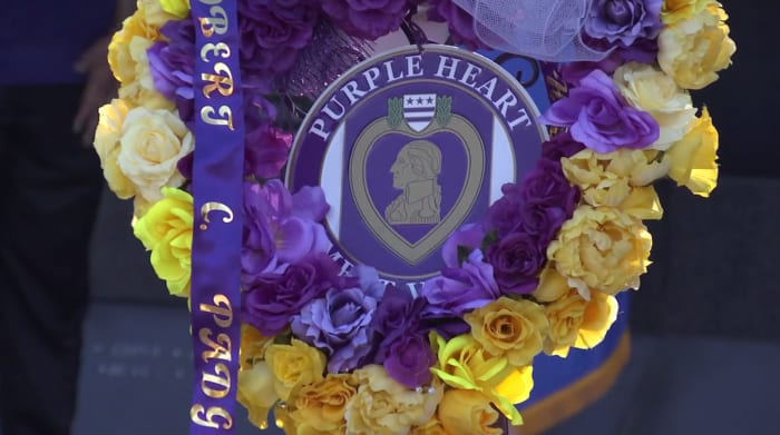 Community invited to honor fallen soldiers  as part of Purple Heart Day ceremony near Veterans Memorial Wall