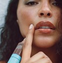 Fara Homidi Expands Lip Line with Skin-First Plumping Oil Release