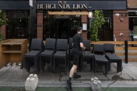 Quebec language watchdog backtracks on pub sign it deemed too English