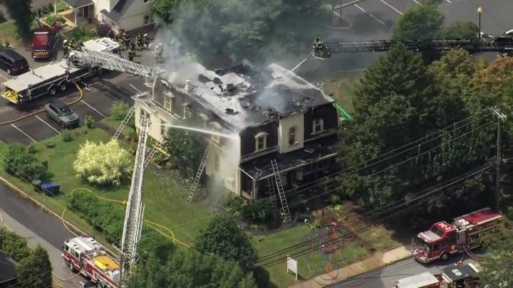 Crews tackle large fire at building in Collegeville: officials