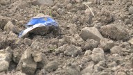 Dirt piles growing at state highway dumping site in Warren Township
