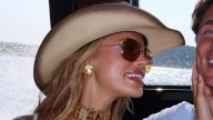 Brooks Nader suffers wardrobe malfunction as she goes braless in white dress on yacht in Italy