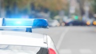 Woman arrested after firing gun in Tukwila parking lot