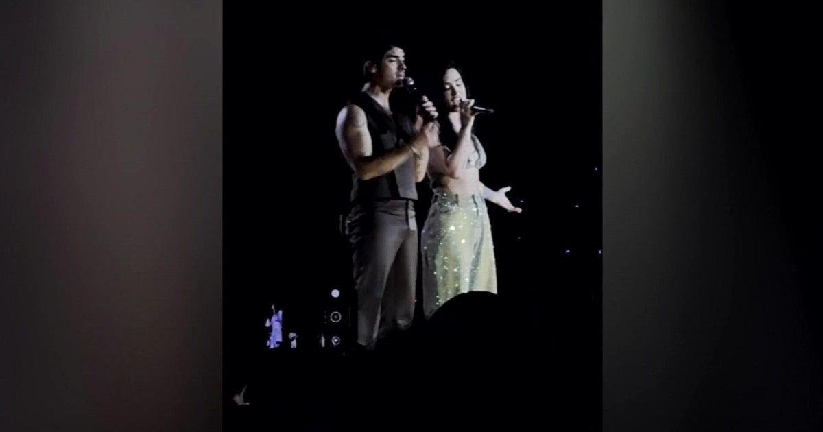 Jonas Brothers surprise MetLife Stadium crowd as Demi Lovato joins them on stage