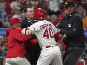 Cardinals' Willson Contreras tossed, hits own coach with bat