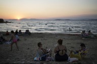 Beach on a budget: Greeks settle for day trips, priced out of iconic destinations