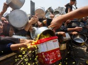Israeli attacks on Gaza kill 23 people as four more die from malnutrition