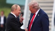 Trump Caught Fawning Over Putin in Kremlin
