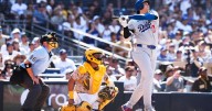 Shohei Ohtani high-fives a heckler after his homer to cap Dodgers' comeback rivalry win over Padres