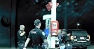 Watch: officers rescue choking driver at gas station