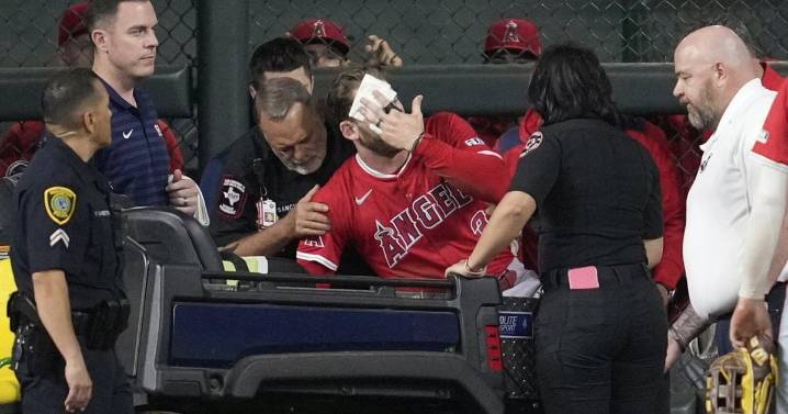 Angels' Taylor Ward carted off field after crashing into scoreboard