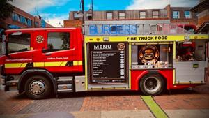 Entrepreneurial friends open burger business in working fire engine