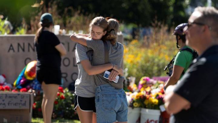 A community gathers for the first Mass after Minneapolis shooting as questions remain