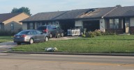 Firefighters contain De Pere garage fire