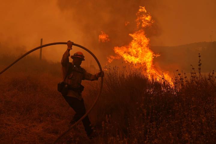 Thousands forced to evacuate as brush fire north of Los Angeles grows