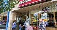 Brewers fans line up to grab free burgers as part of local fast