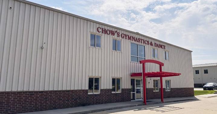 Years after abuse reports, ex-coach at renowned US gymnastics academy is arrested by FBI