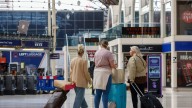 Two-hour queues and 'do not travel' warning as strikes hit bank holiday travel