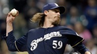 Even on his special day, John Axford tips his cap to Bob…
