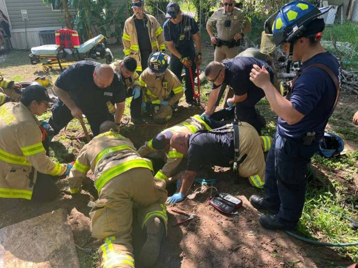 Man falls in septic tank, found trapped underneath tire