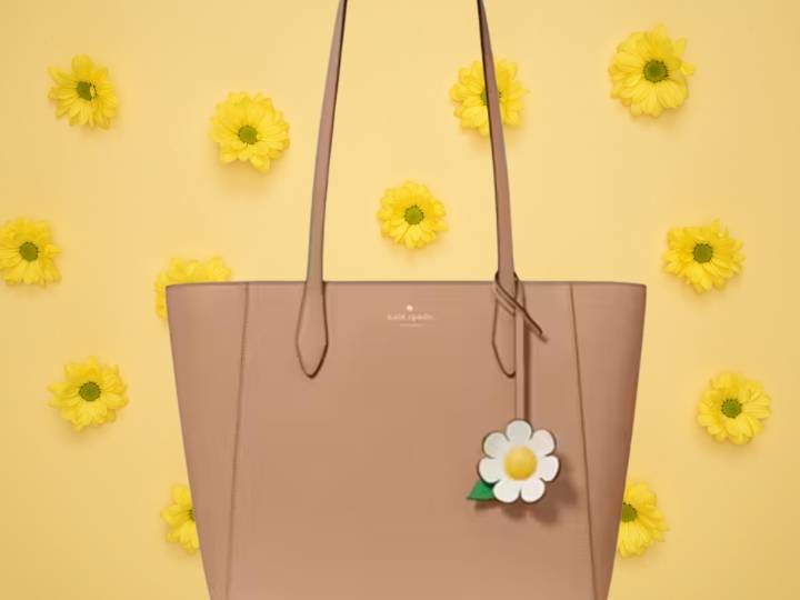 Cute $359 Kate Spade Outlet daisy charm tote with over 4,000 views in a day now just $89