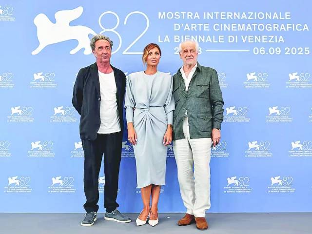 Venice heats up with Clooney, Stone premieres