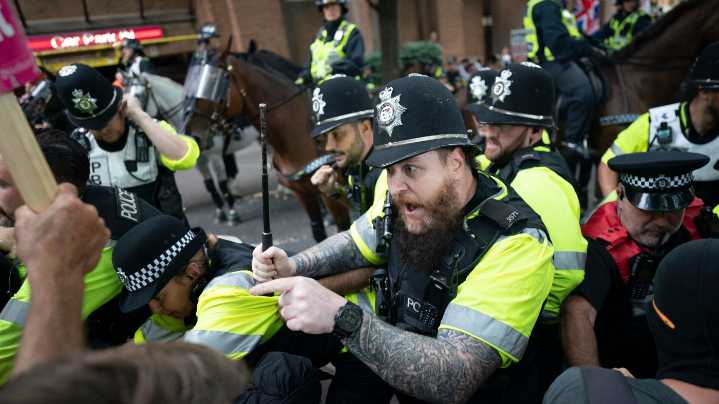 U.K. migrant protests spark angry confrontations : NPR