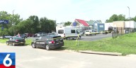 SCENE VIDEO: Agencies serve warrants at motel in Southwest Omaha