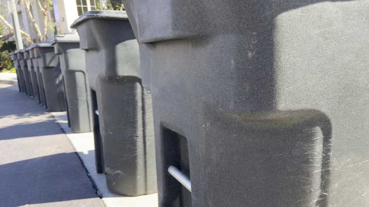 What Is The Bar On Your Garbage Bin For?