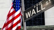 Wall Street holds near its record heights