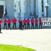 Founder of neo-Nazi group spotted among masked protesters in Concord